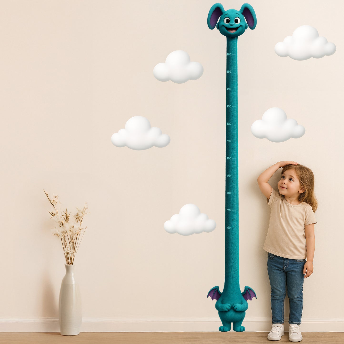 Child standing next to a height chart with a cartoon character on a beige wall with clouds.